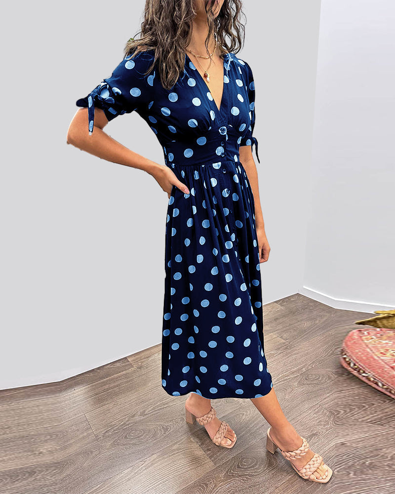 Idalia - Dress with deep V-neckline and polka dots