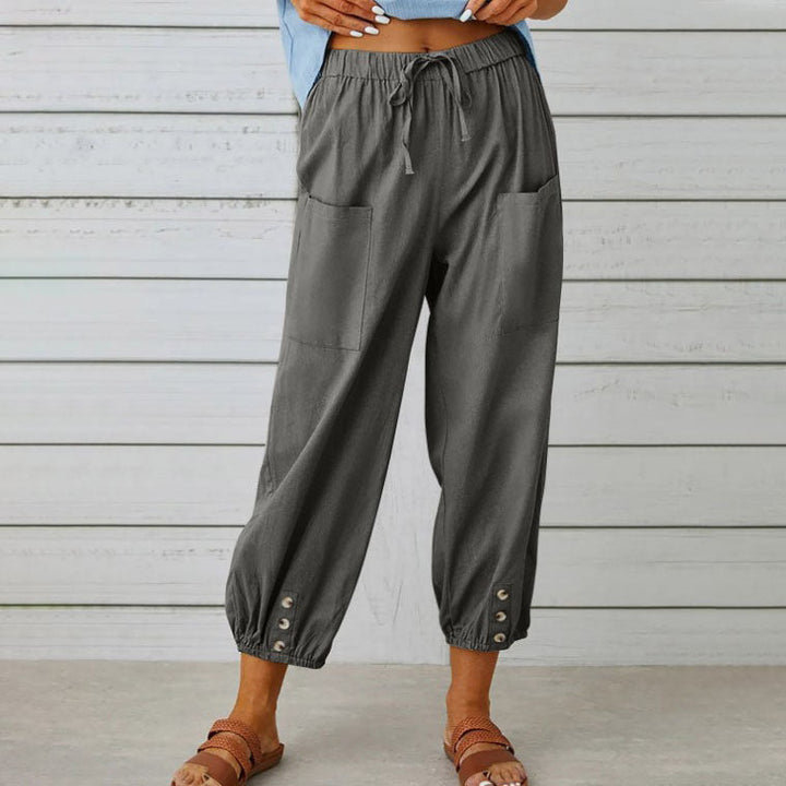 ADELLA - Pants with wide pant legs