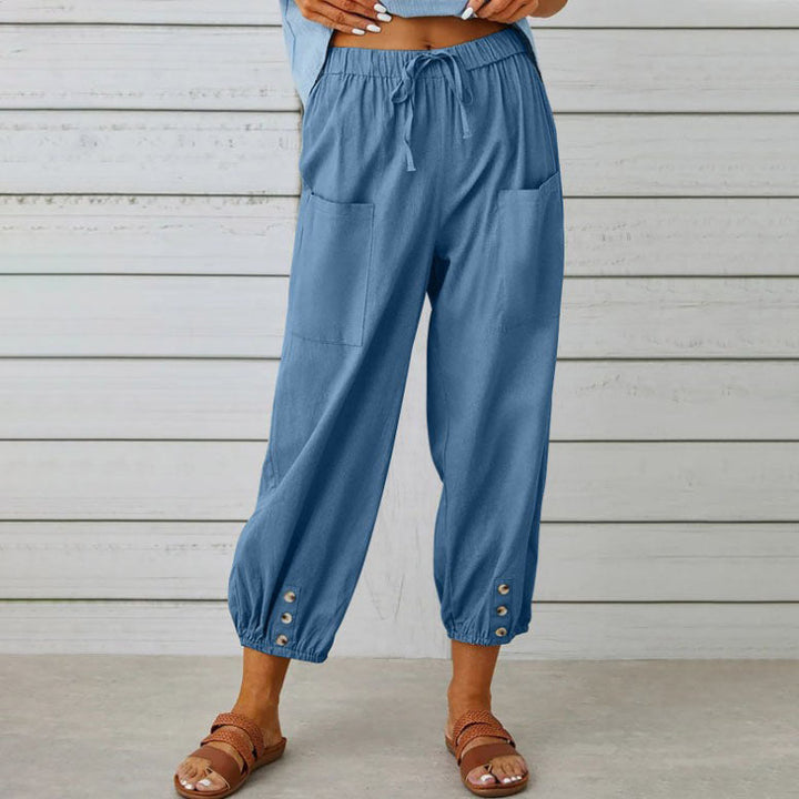 ADELLA - Pants with wide pant legs