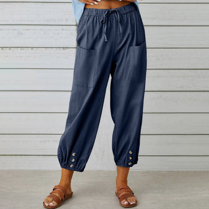 ADELLA - Pants with wide pant legs