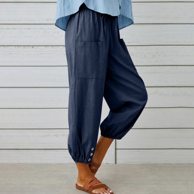 ADELLA - Pants with wide pant legs