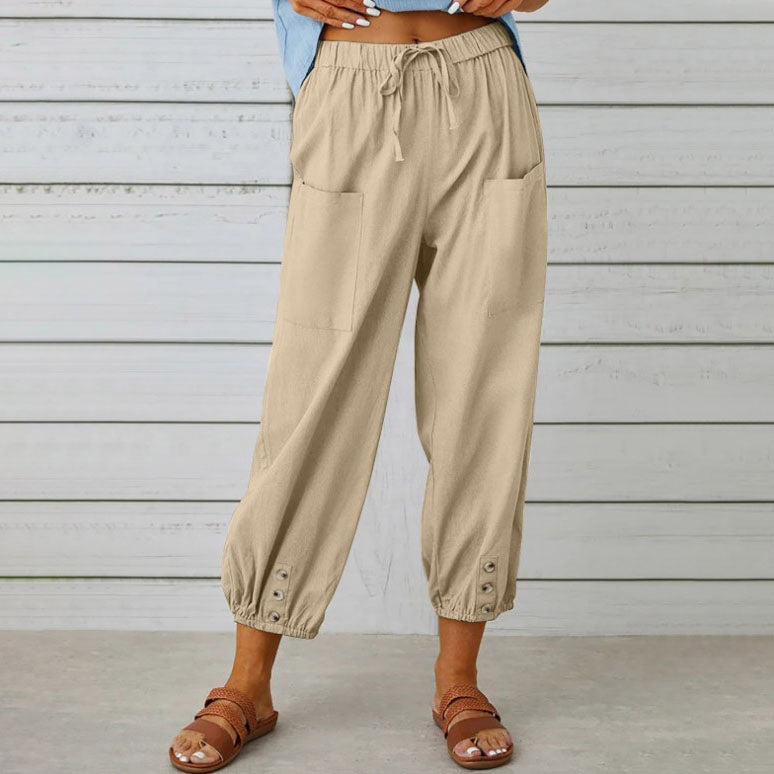 ADELLA - Pants with wide pant legs