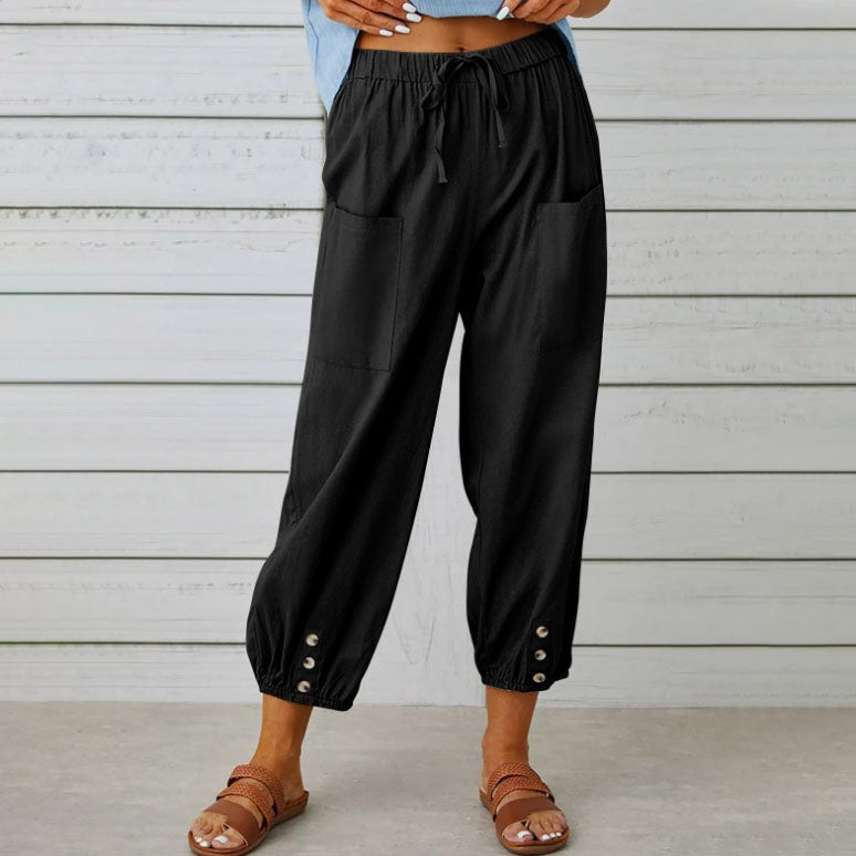 ADELLA - Pants with wide pant legs