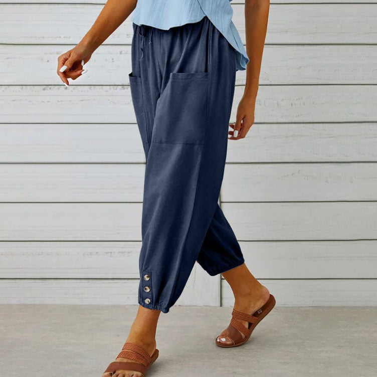 ADELLA - Pants with wide pant legs