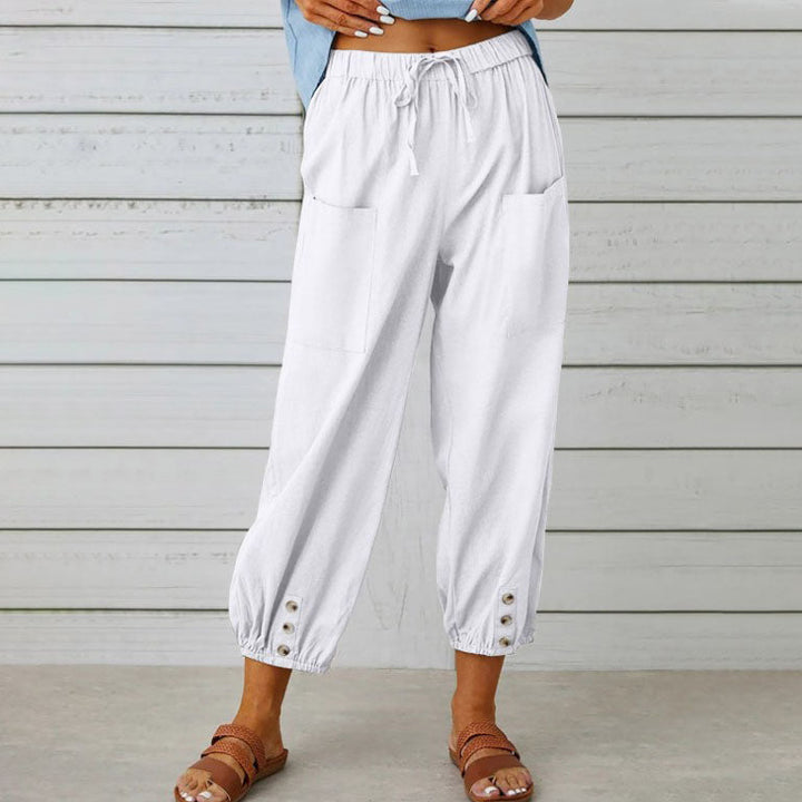 ADELLA - Pants with wide pant legs